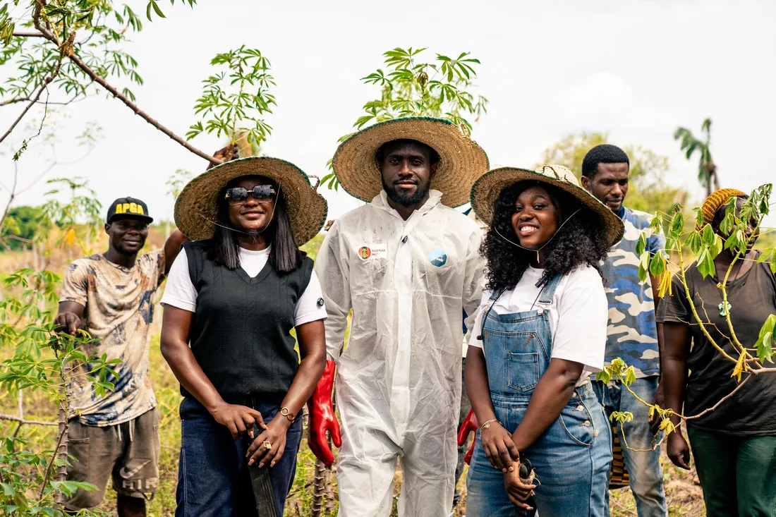 A group of agricultural trainees in a field